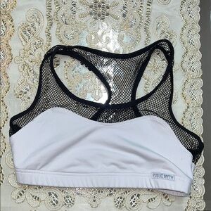 Public Myth white sports bra with black mesh straps